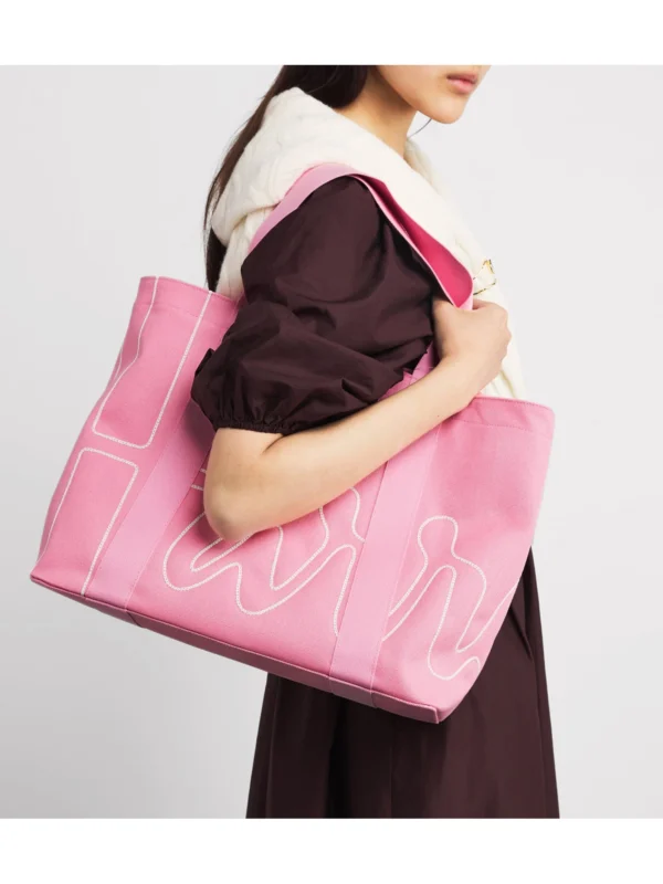精品沙灘包雙人提手設計與包口車縫工藝，適合肩背與手提 (粉紅)