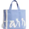 Harrods 粉藍色重磅厚帆布托特包正面，展示立體毛巾電繡品牌 Logo