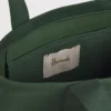 大容量 Harrods 帆布購物袋內部空間，配有實用的內置插袋設計