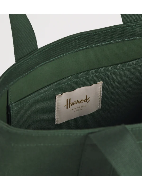 大容量 Harrods 帆布購物袋內部空間，配有實用的內置插袋設計