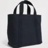 HARRODS Small Cotton Canvas British Rosette Tote Bag_2 英國直購正品 Harrods 女用手提包背面質感展示,深藍色帆布極簡百搭