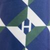 HARRODS-Geo-Clash-Umbrella_3-mc Harrods 幾何印花折疊雨傘收折狀態,展示便攜尺寸與整體綠色配色