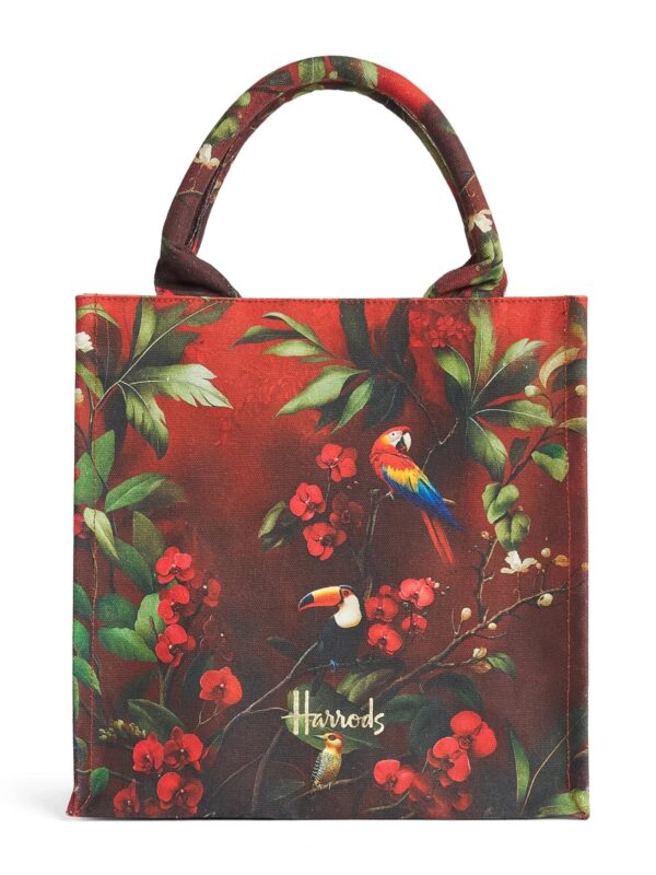 英國 Harrods 紅色熱帶鳥類印花手提包正面,展示通體印花與雙手提帶設計