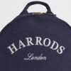 HDBC2632002-69_4-mc Harrods 刺繡背包開口內部與前拉鍊口袋細節,展示多隔層收納空間
