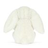 JCDB2610008-00-Cream-Bunny-with-Star-31cm_4-mc JELLYCAT 奶油兔與金蔥星星娃娃整體情境擺拍,呈現床邊陪伴與送禮包裝氛圍
