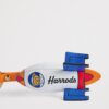 HDAK2630003-00_2 英國 Harrods Pop Rocket 白色皮革火箭鑰匙圈側面角度,呈現立體造型與金屬掛環