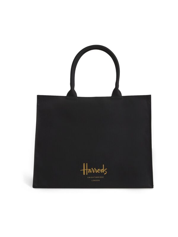 HDBB2432001-09_1-uni 英國 Harrods 黑色棉質托特包正面全景,金色燙金 Logo 清晰可見