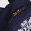 HDBC2542003-69_4 Harrods 海軍藍棉質後背包內部隔層與內側插袋展示,呈現寬敞收納空間