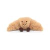 JCDB2540011-82_1-uni-1 英國 JELLYCAT Amuseables Croissant 牛角包絨毛娃娃正面,展示焦糖棕色酥皮層次造型與燦爛笑容