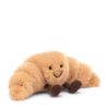 JCDB2540011-82_2 JELLYCAT 牛角包娃娃側面特寫,呈現圓潤飽滿身形與毛絨材質細節