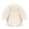 JCDB2630018-00_4 JELLYCAT 奶油漿果兔放置於嬰兒床邊或房間場景,展示居家陪伴與擺設效果