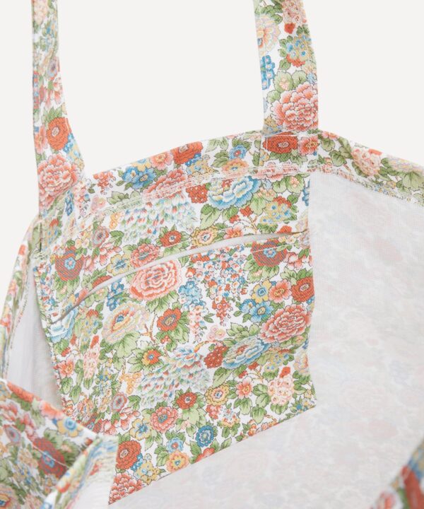 Liberty London 粉紅碎花托特包平放俯視，完整展示 Elysian Day 印花圖案排列