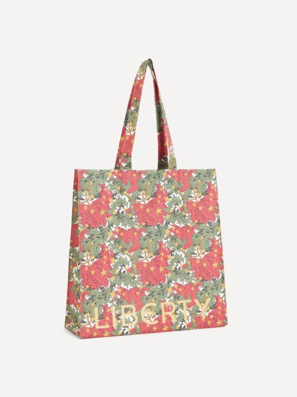 Liberty London 手提袋側面與提把細節,展示棉帆布質地與雙肩帶設計